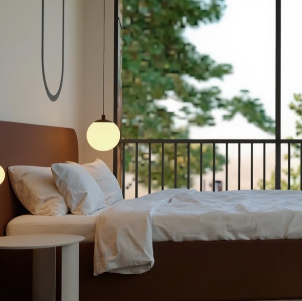 Alcoba con balcon y vista a los arboles